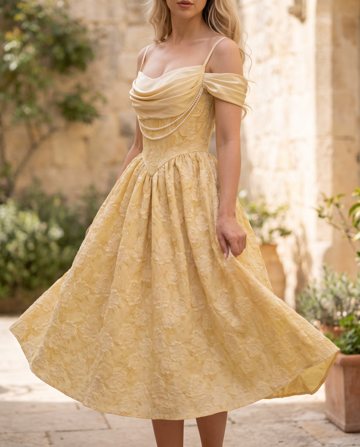 The BIA Séraphine Pearl Midi in movement, the jacquard skirt turning in daylight.