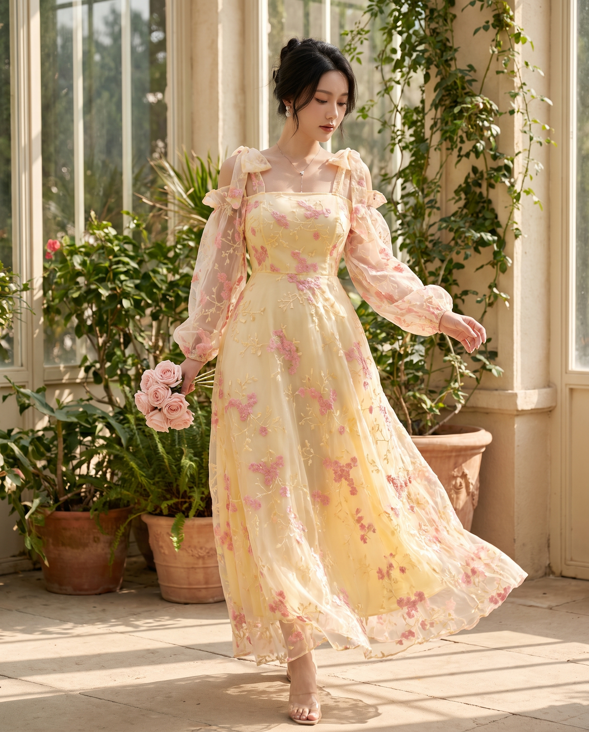 The BIA Élodie Bishop Maxi in movement, the sheer embroidered organza lifting in a bright conservatory.