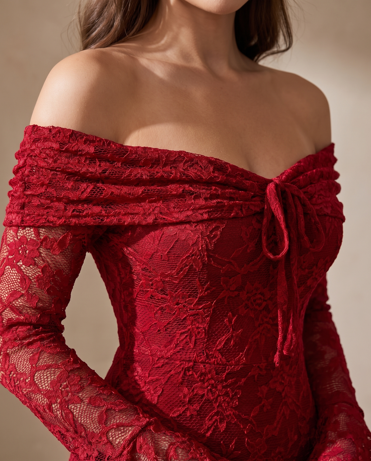 Detail of the BIA Valentina Mermaid Gown showing the gathered lace off-shoulder band and centre tie.