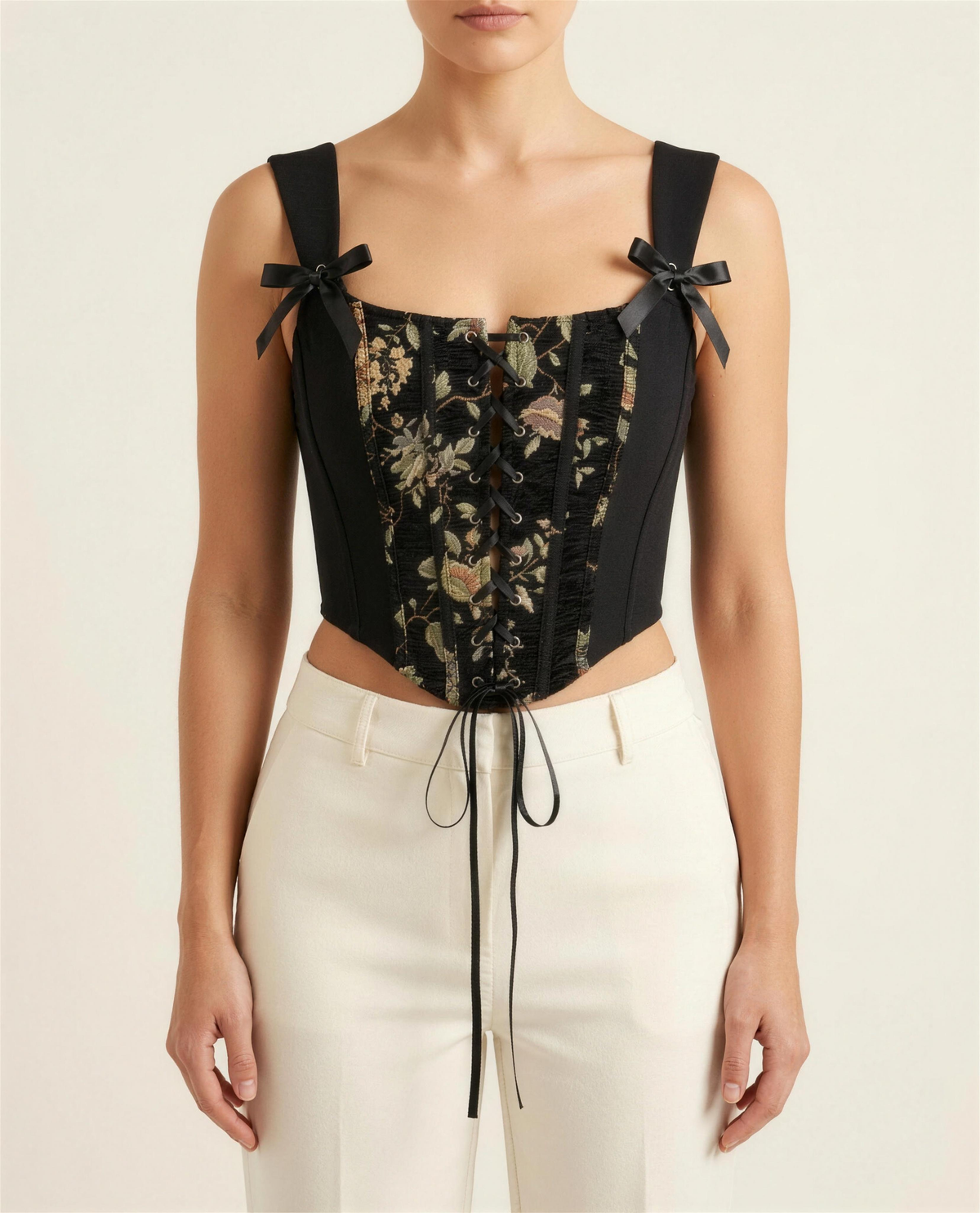 BIA black jacquard bustier, clean studio front view showing the square neckline, tapestry centre panel and grommet lacing.