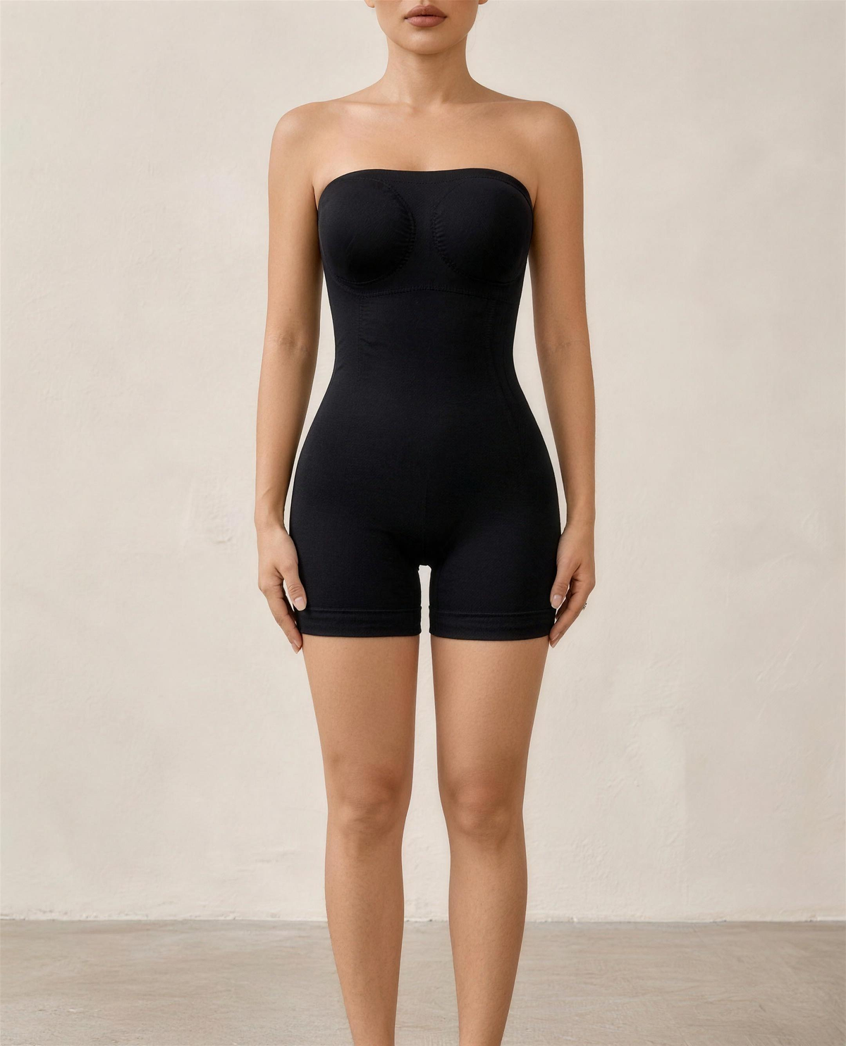 The Halo Strapless Shaping Bodysuit in black, full front view