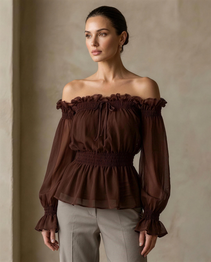 The Cassia Off-Shoulder Blouse in coffee brown chiffon, three-quarter view