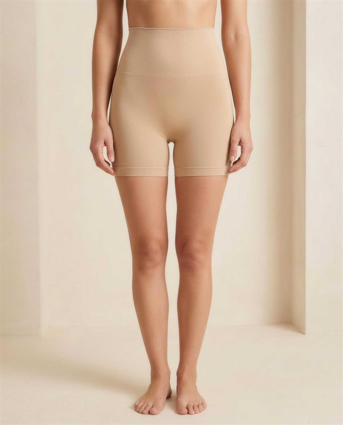 The Lune High-Waist Shaping Short in warm beige, front view showing the plain high waist edge