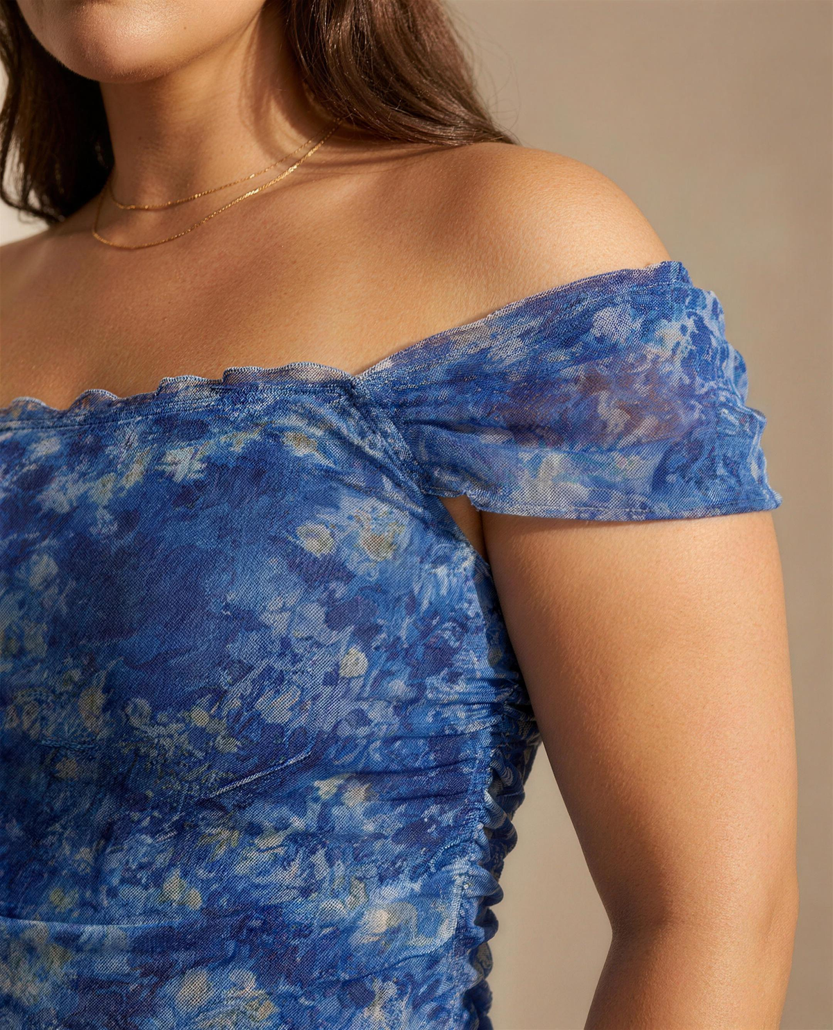 Close detail of the printed mesh weave, lettuce edging and vertical ruching