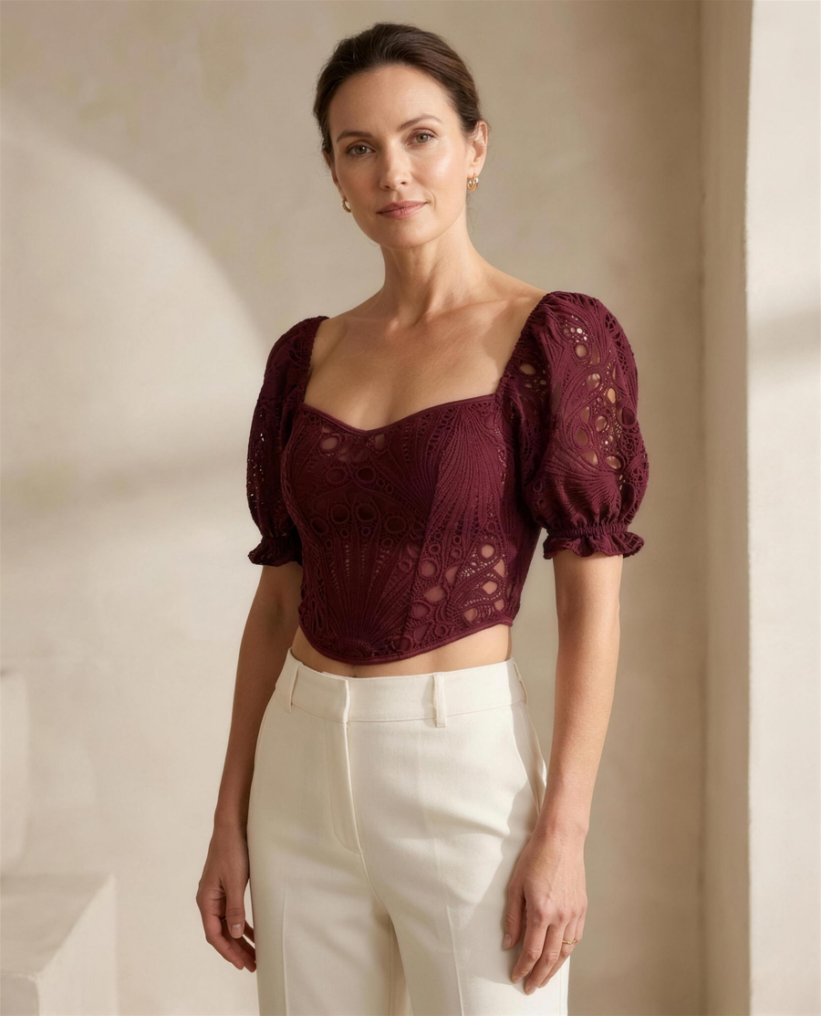 The Odile Openwork Top in burgundy, sweetheart neckline with short puff sleeves in openwork knit
