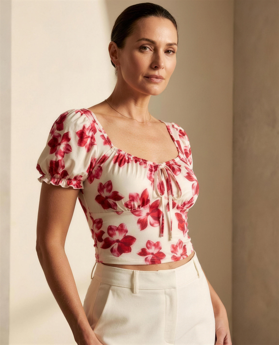 The Marlowe Floral Crop Top in cream and red watercolour floral jersey, drawstring sweetheart neckline and puff sleeves