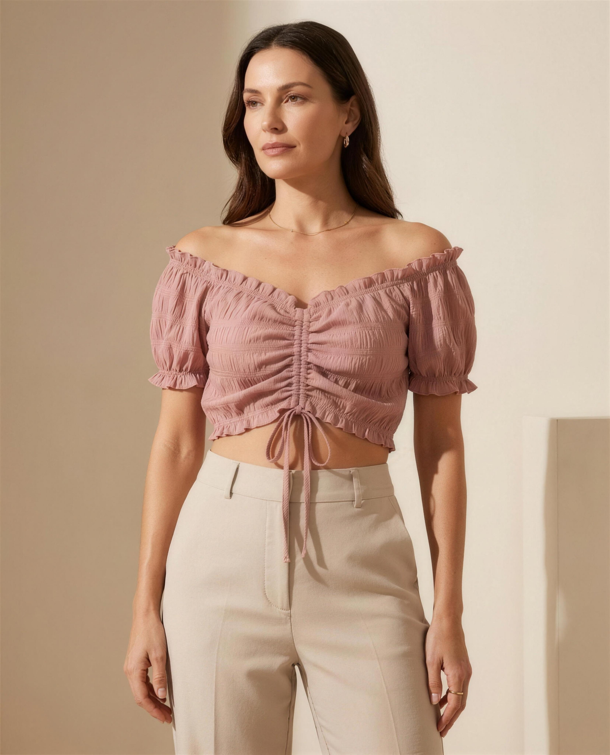 The Elowen Ruched Blouse in dusty rose, off-shoulder frilled neckline with centre-front drawstring ruching