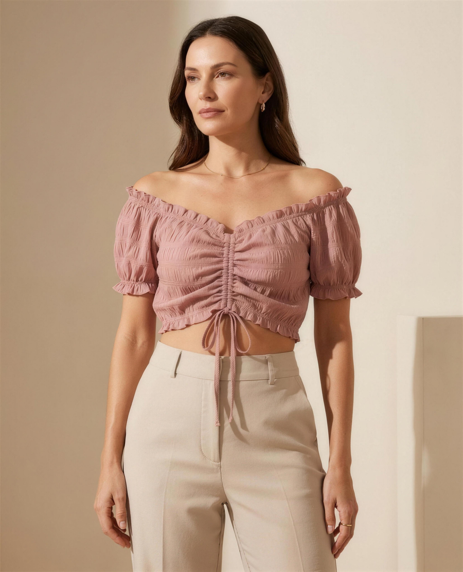 The Elowen Ruched Blouse in dusty rose, off-shoulder frilled neckline with centre-front drawstring ruching