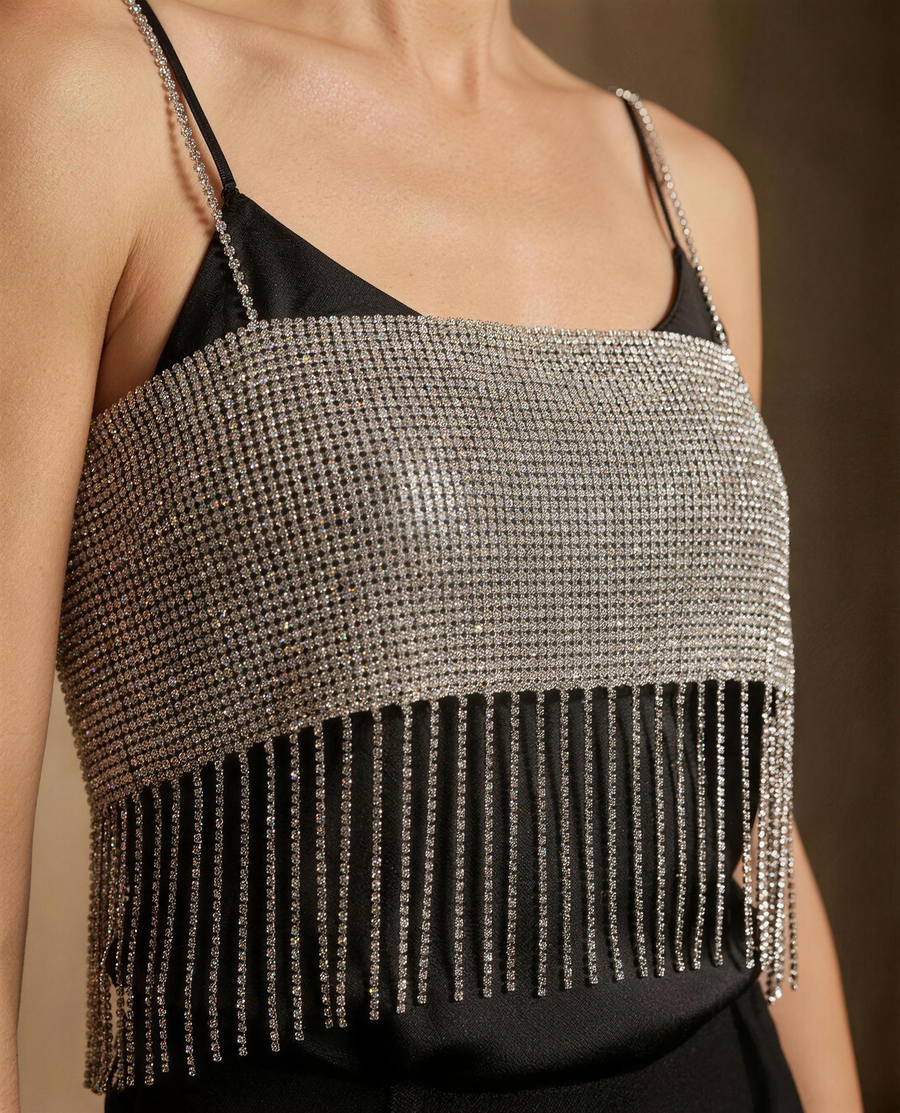 Close detail of the rhinestone paving, chain strap and crystal chain fringe